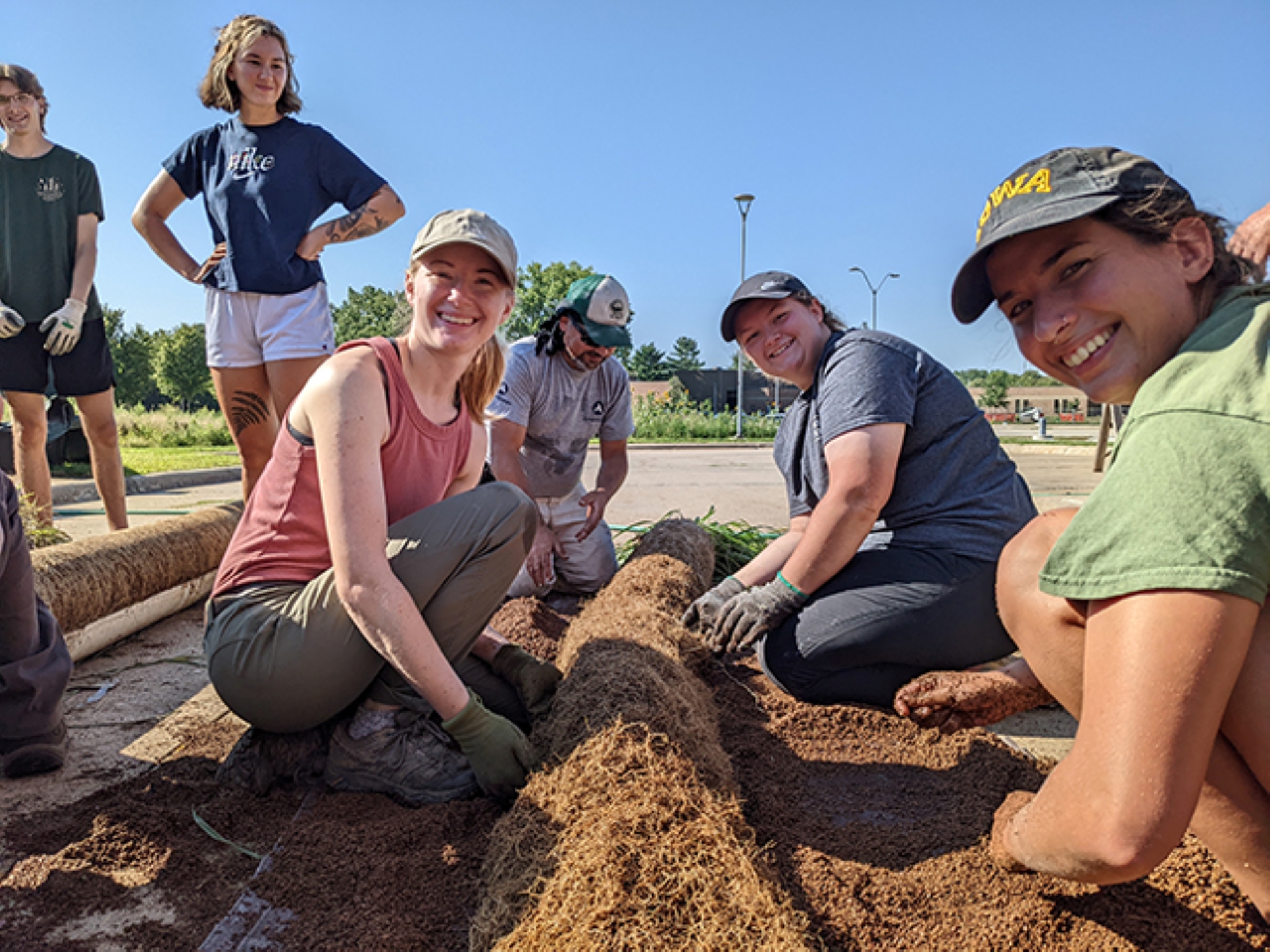 Students helping with Root Pull